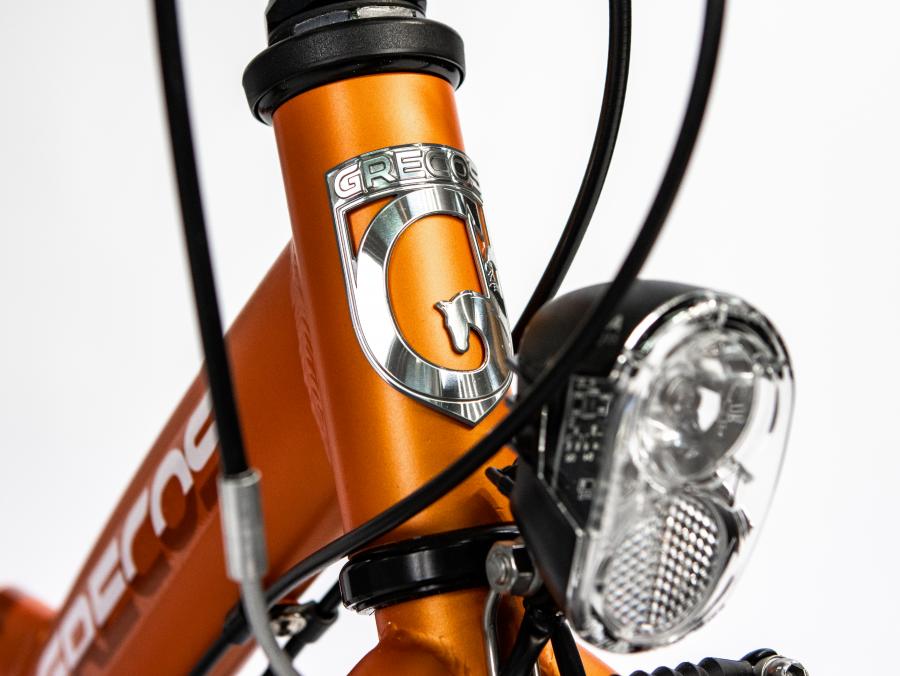 Grecos Steuerkopfemblem